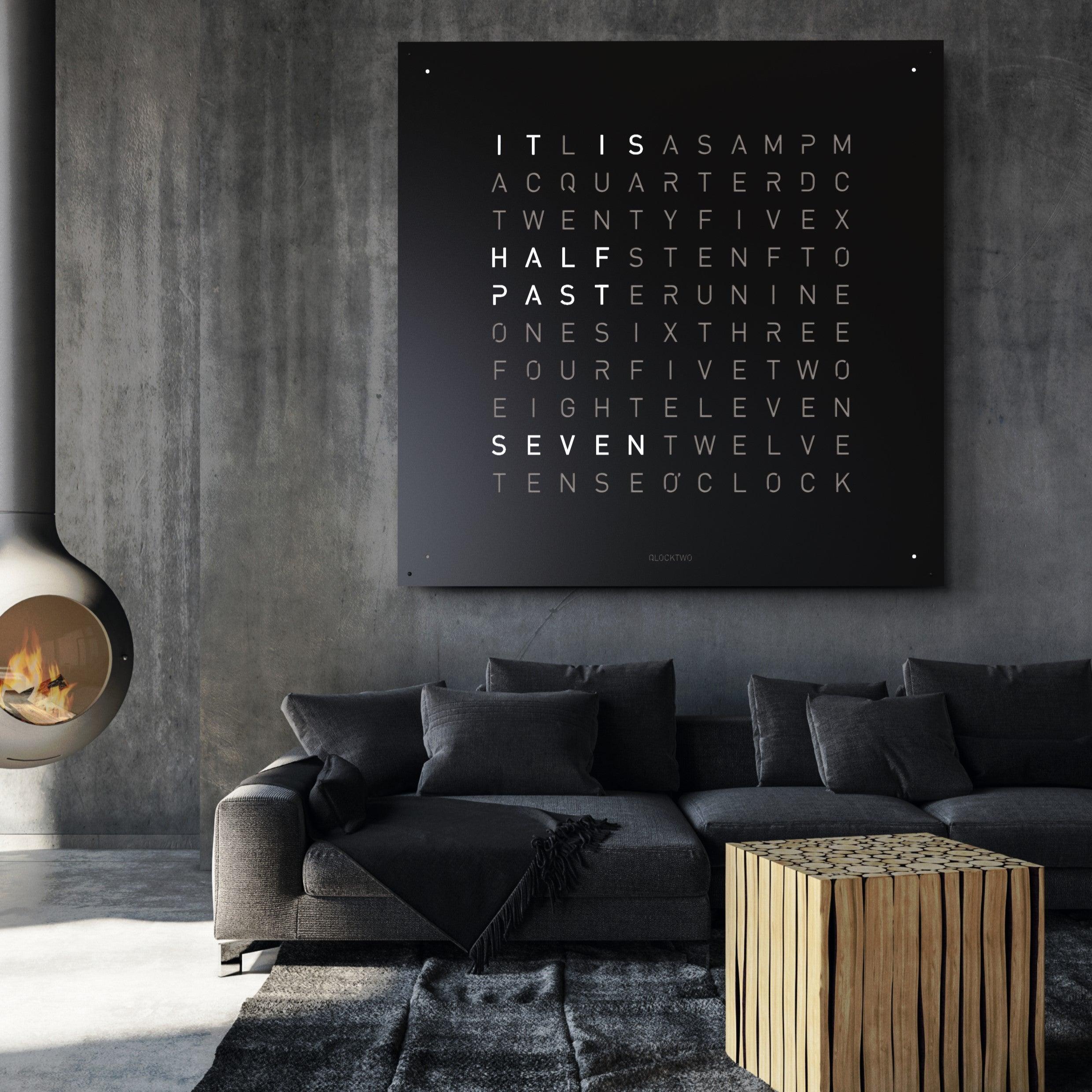 QLOCKTWO EARTH 180 BLACK PEPPER – luxury wall clock in matte black, crafted for architectural interiors and premium design spaces