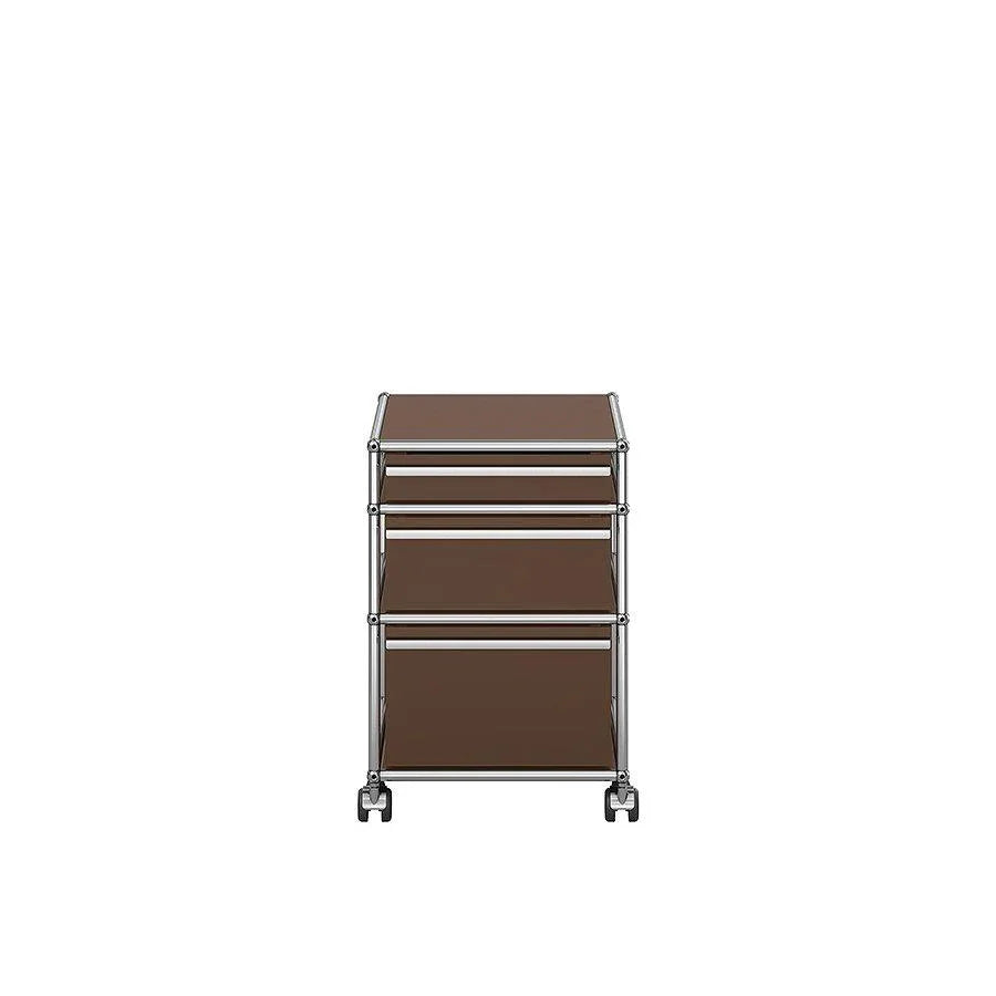 Eleganter Rollcontainer M63 von USM Haller in Braun – Retro-inspiriertes Design für klassische Einrichtungskonzepte und warme Bürostimmungen