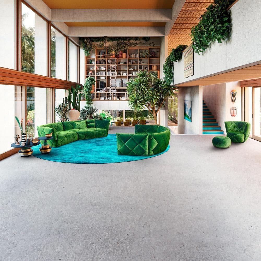 Modern eingerichtetes Wohnzimmer mit dem TERATAI G106 Sofa von Bretz in Grün – stilvolles Designerambiente mit organischer Sofalinie und zeitloser Eleganz