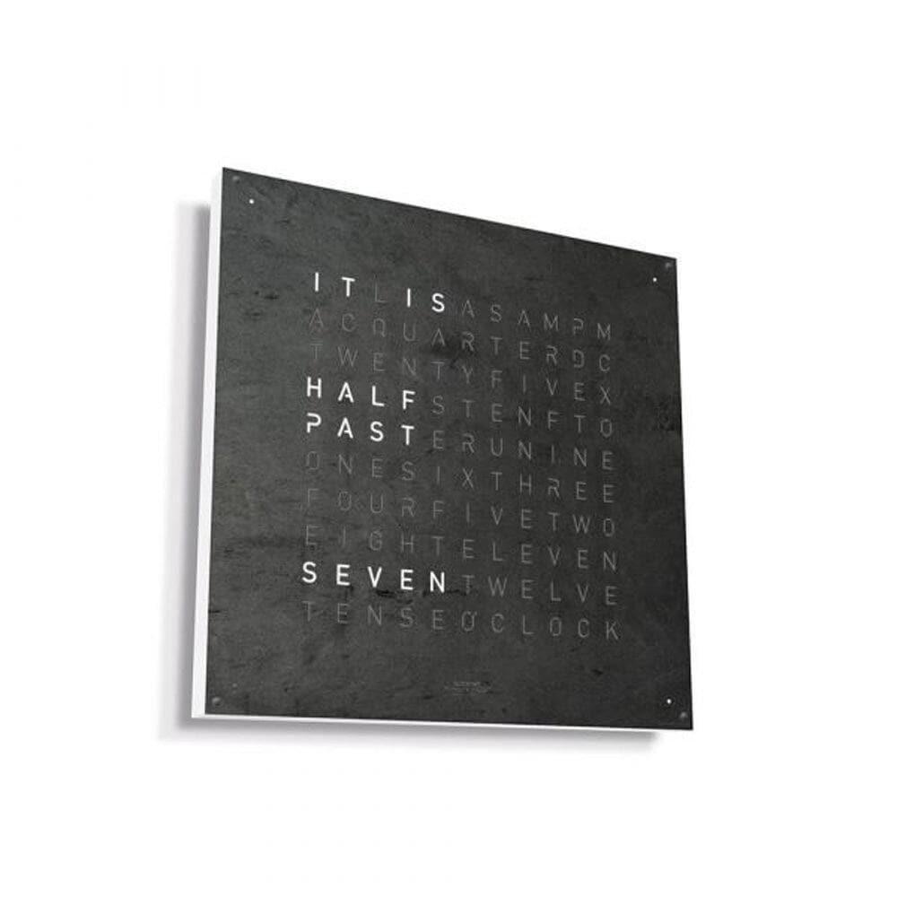 QLOCKTWO EARTH 45 with white frame – natural stone meets clean design for a contemporary wall statement